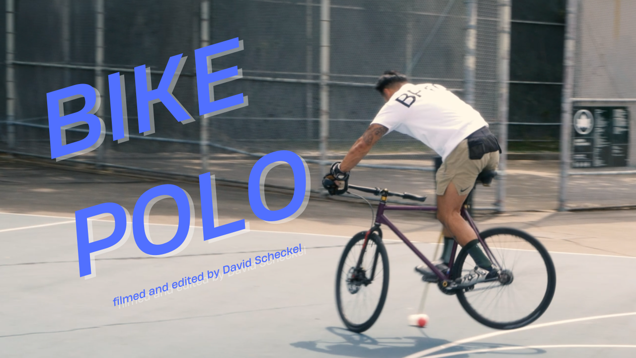 Title card: a player leans over the handlebars chasing the ball on a fenced court, BIKE POLO set across the frame in blue
